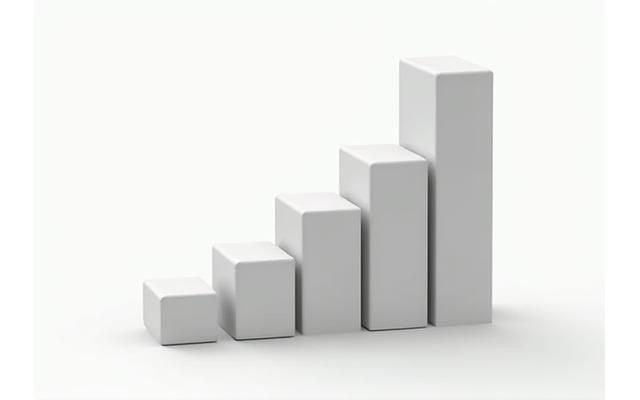 Bar chart comparing AkquiVest Passive House energy consumption against standard building codes, showing significant reduction.